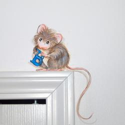 A wee little mouse holds the initial of the bedroom's owner