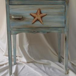 Cigar Cabinet - AFTER - Cigars were traded in for a Seaside Starfish and a weathered finished to be used as added storage in a bathroom. - 